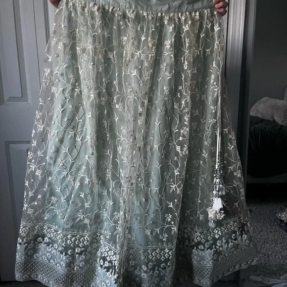 Turquoise Net Embroidered Lehenga Choli - Picture 5 of 9